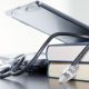 Medical stethoscope and laptop and books