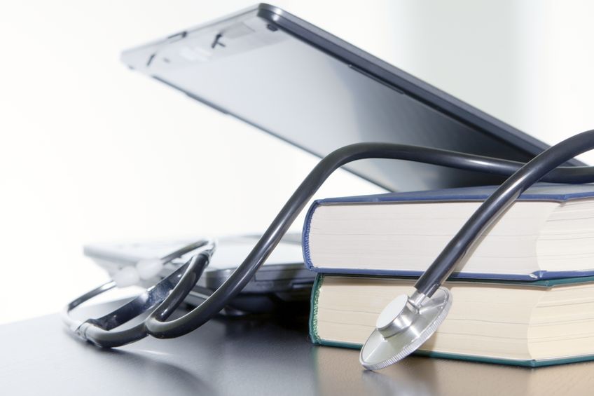 Medical stethoscope and laptop and books Medical stethoscope and laptop and books