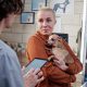 Vet discussing treatment with pet owner